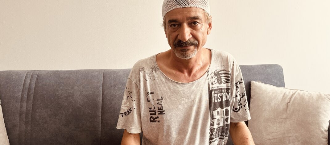 Kafasına binadan kopan beton parçası düşen kişi yaralandı